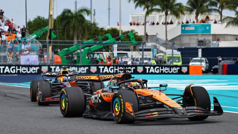 Oscar Piastri leads Max Verstappen (Red Bull-Honda) during the 2025 Miami Grand Prix