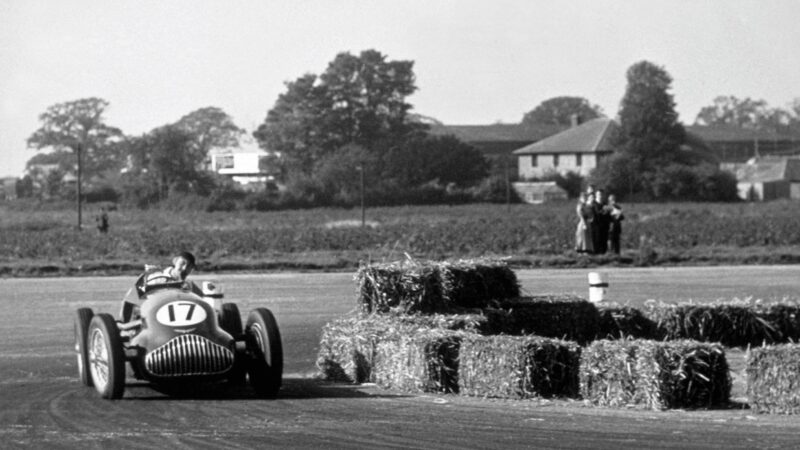 George Watson rounds the hay at Silverstone, 1948