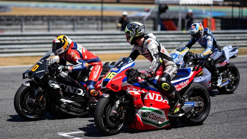 Joan Mir as Luca Marini makes MotoGP practice start