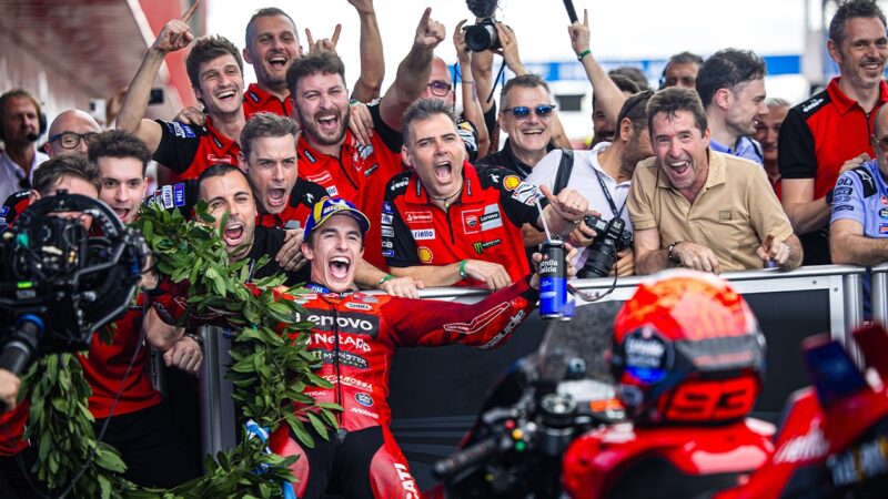 Marc Marquez celebrates with Ducati team in the pitlane after winning the 2025 MotoGP Argentine GP